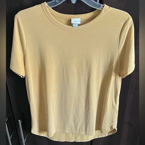 a new day mustard tshirt
